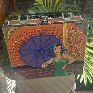 Artistic Orange Handbag with Black Handle